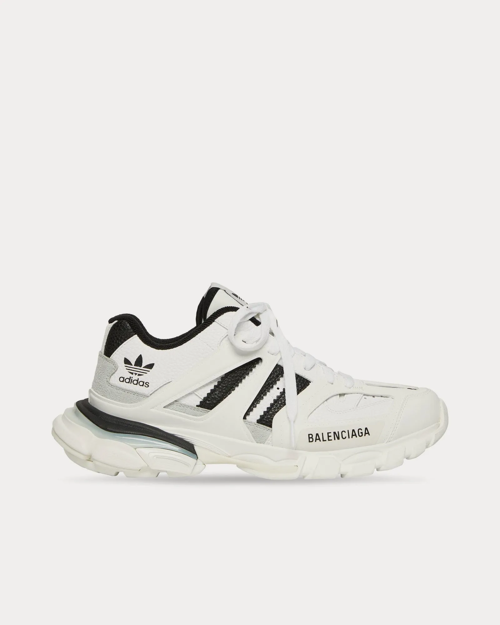 Track Forum White / Black Low Top Sneakers