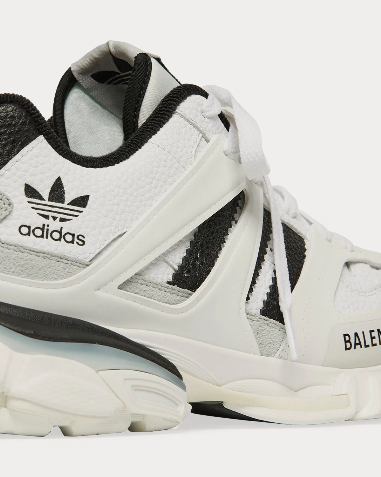 Track Forum White / Black Low Top Sneakers